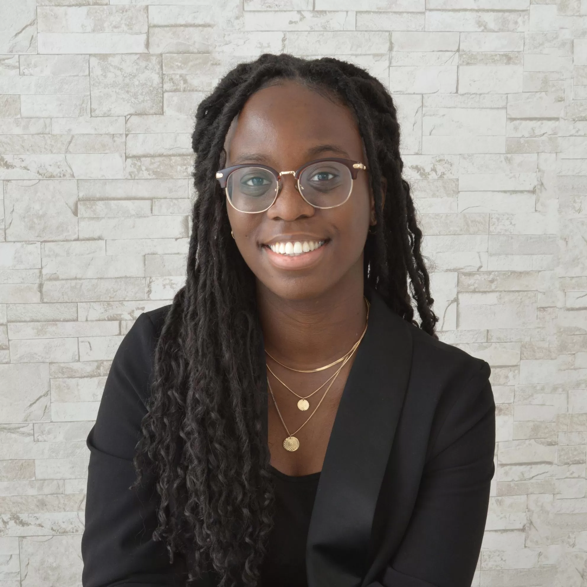 Portrait of Audrey Luguterah, Registered Social Worker and Psychotherapist, providing counselling for individuals, families, children, teens, and adults.