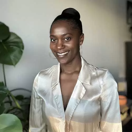 Portrait of Lydia Ocharo, Registered Social Worker and Psychotherapist, supporting individuals, couples, families, children, teens, and adults.