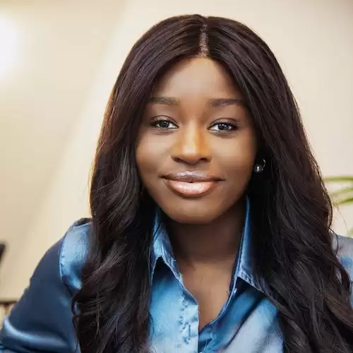 Portrait of Nila Mensah, Registered Social Worker and Psychotherapist providing therapy for individuals, couples, and families
